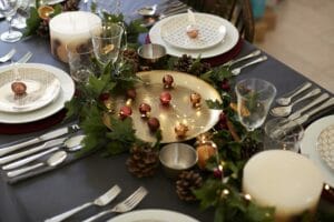 Christmas table setting with bauble name card holders arranged on plates